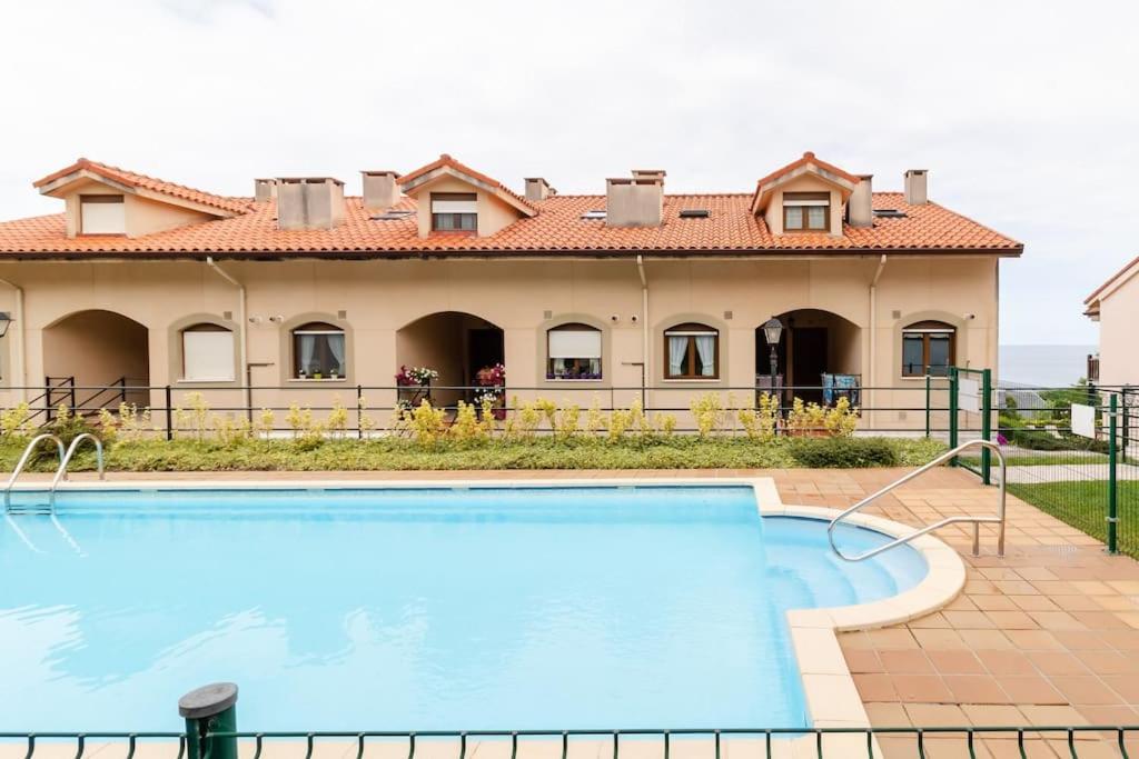 Casa De Las Flores - Apartamento Con Jardin Privado Frente A La Playa De Комилас Екстериор снимка