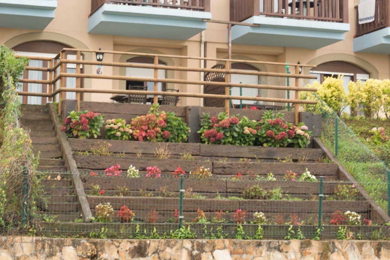 Casa De Las Flores - Apartamento Con Jardin Privado Frente A La Playa De Комилас Екстериор снимка